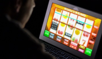 spinning slot machine reels on a tablet
