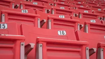 empty seats in an empty sports stadium