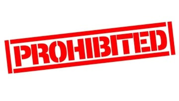 a red stamp saying Prohibited on a white background