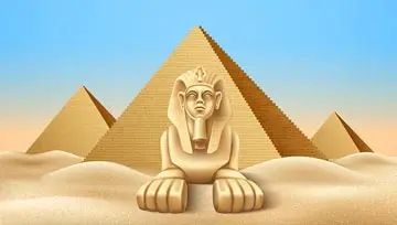 sphinx sitting in front of an Egyptian pyramid