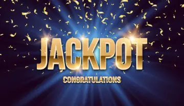 jackpot sign on a blue background with gold glitter flying everywhere