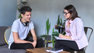 teen being interviewed by a therapist