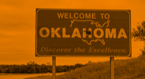 Welcome to Oklahoma sign alongside the road